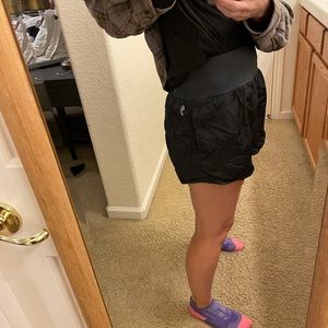 Free People. Running shorts. Dark teal. Waste zipper pocket. Large. Lining insid